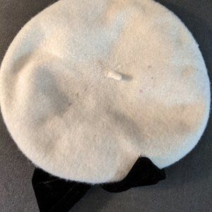 White brette with black bow